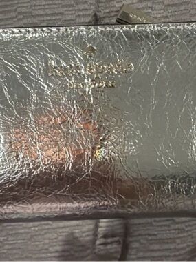 kate spade Metallic Crinkle Silver Leather wallet. new without tags